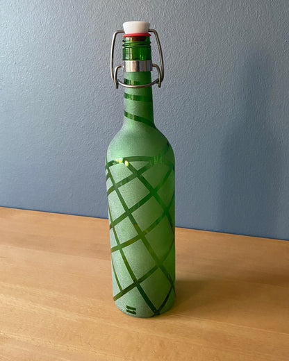 Vandflaske med patentlåg "Criss Cross"