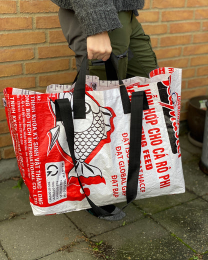 Multifunktionstaske i genbrugte materialer